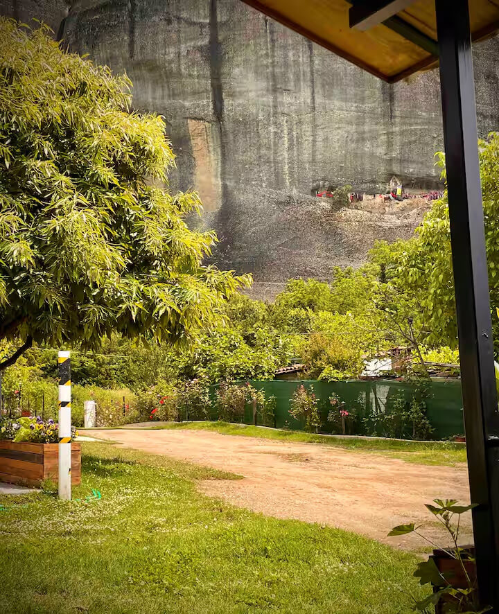 The property garden with the Meteora rocks behind